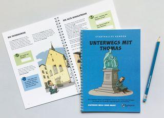 Die Rallye "Unterwegs mit Thomas" Das Heft zur Thomas-Rallye aufgeschlagen mit Innenansicht